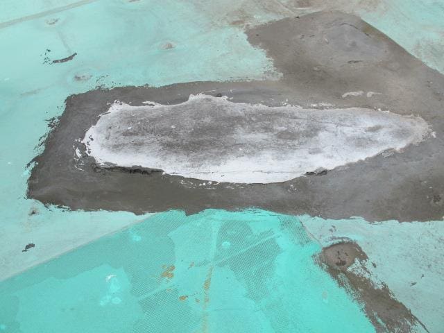 Flat roof with fungal growth and ponding water from a flat roof survey